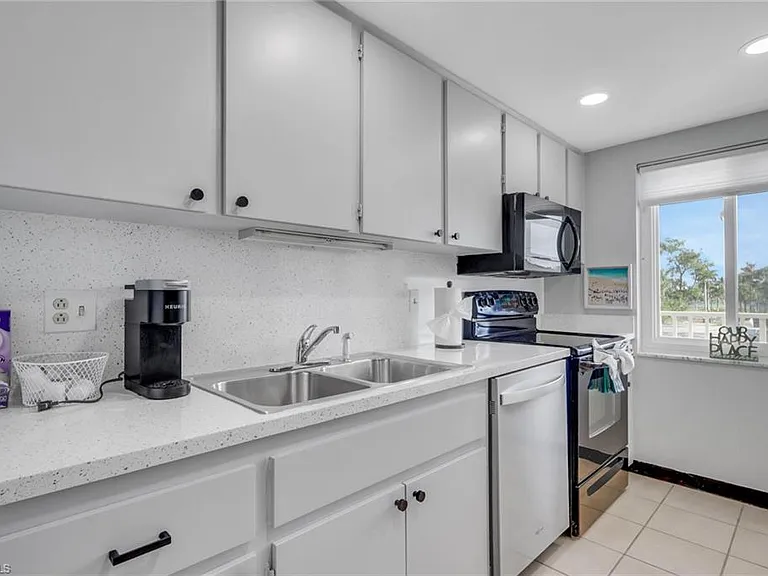 7400 Estero Blvd #214 — Photo 4