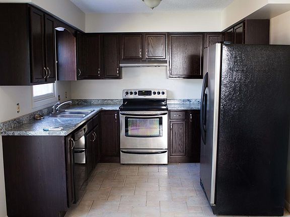 Updated cabinets, countertops, sink, hood, etc.