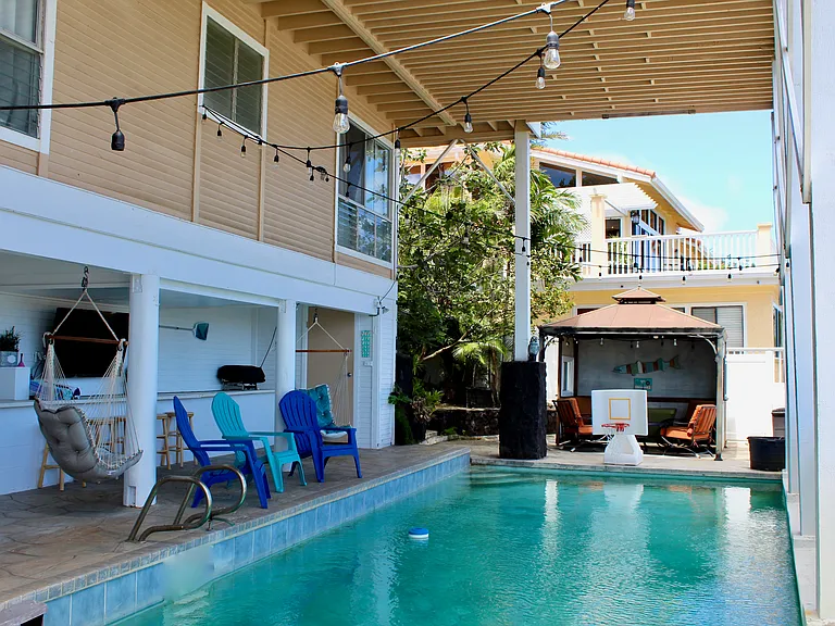 Another view of pool and cabana area.