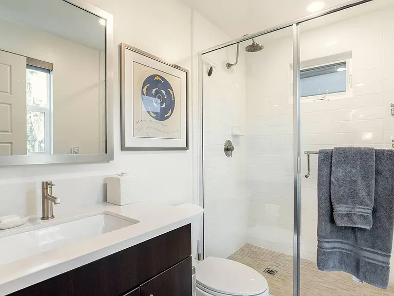 All bedrooms feature their own private ensuite bathrooms. This bathroom is the one connected to the office/guest bedroom.