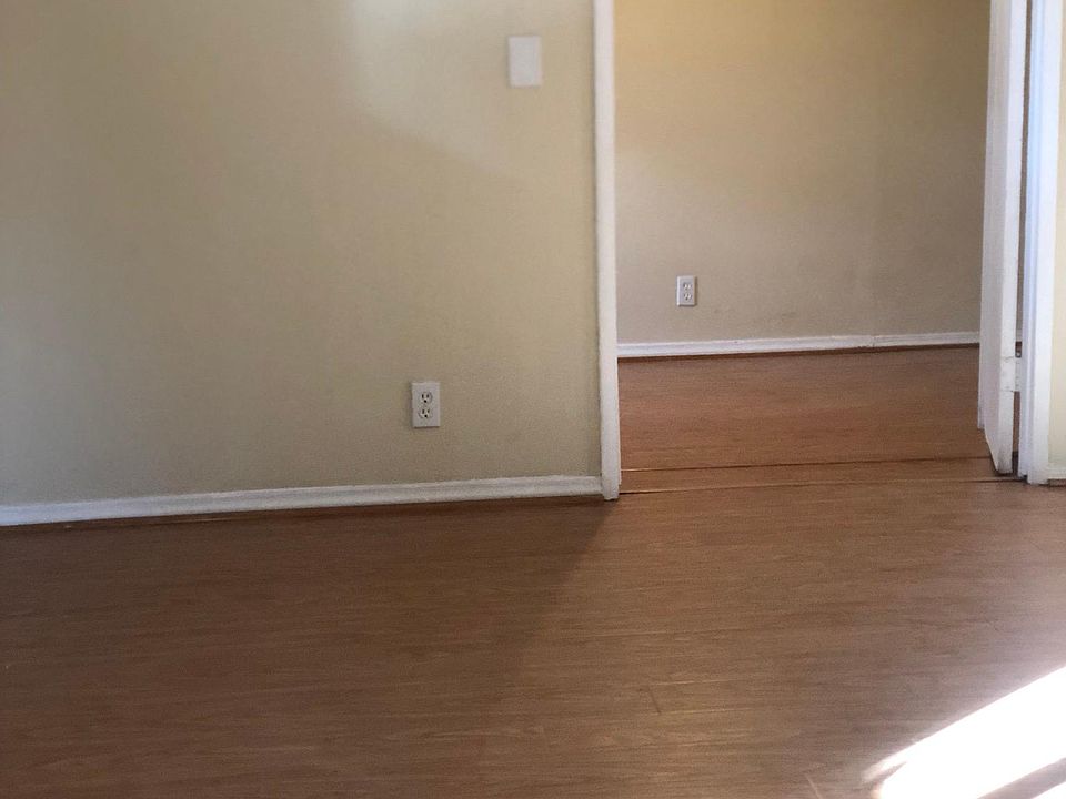 Bedroom with new laminate flooring