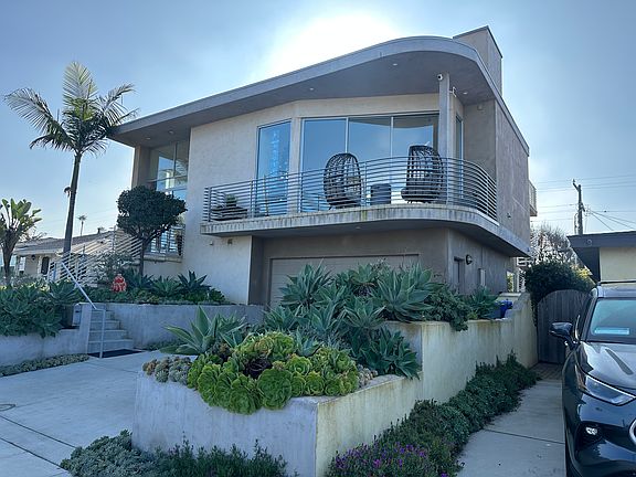 The balcony faces out to the dunes and overlooks Camp Surf.