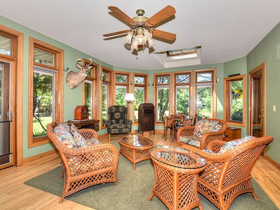 Sunroom wrapped in windows