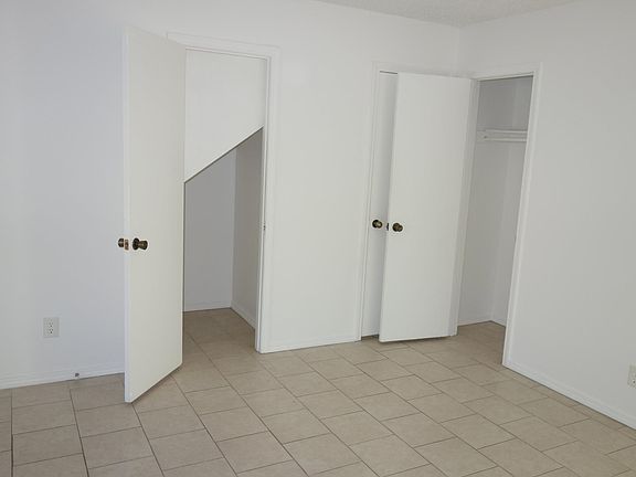 Understairs closet and coat closet