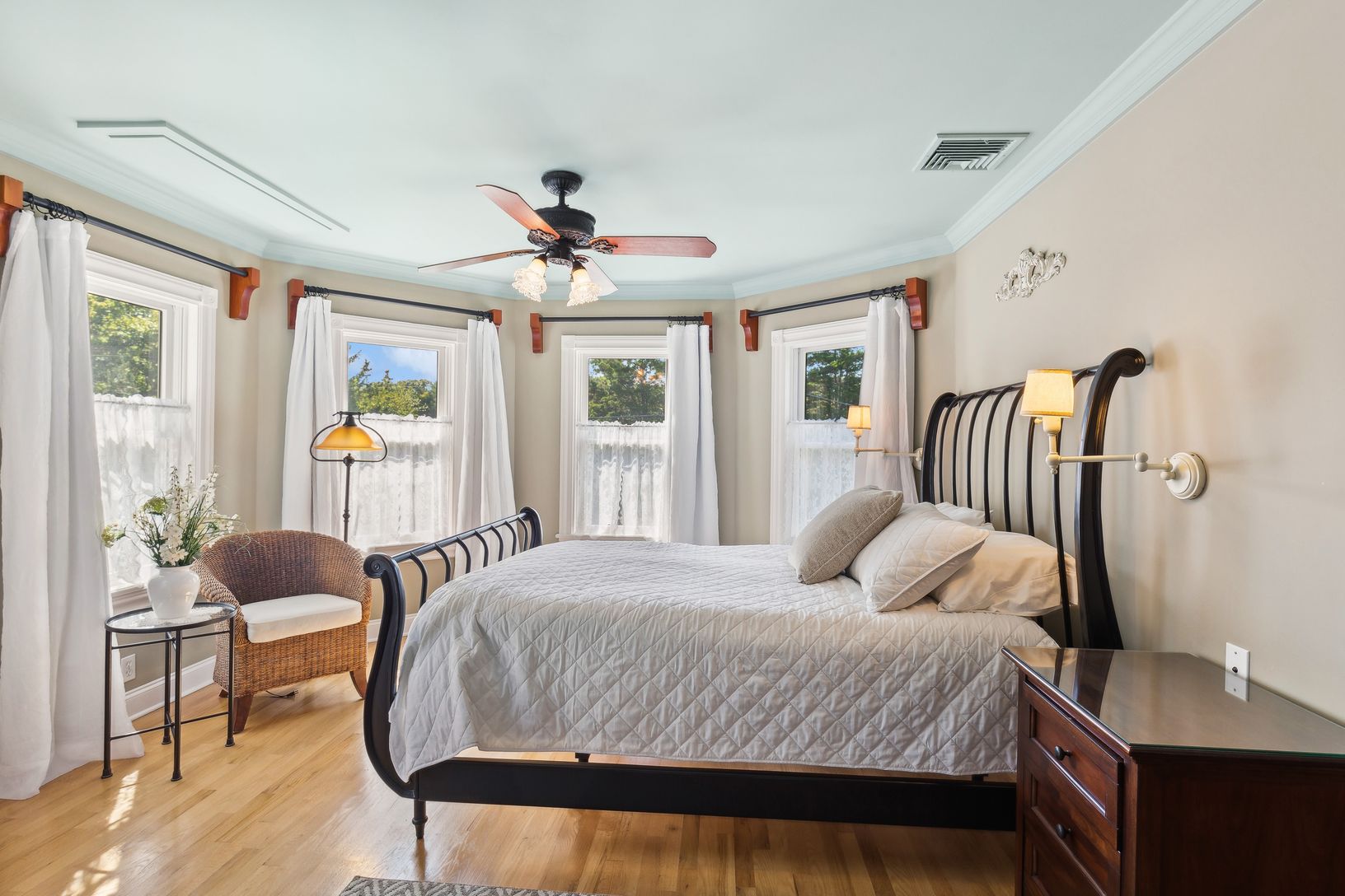  Primary Bedroom En Suite. A Flat Screen Television Lowers from Ceiling in Front of Bed