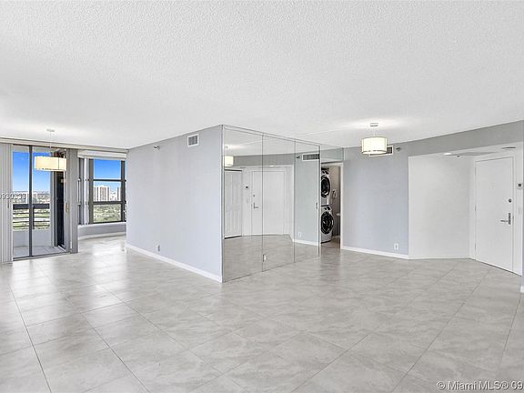 5th image of 3500 Mystic Pointe Dr APT 2403