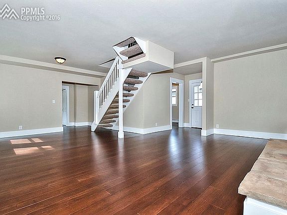 The Family-room Showcases an Impressive Open Staircase!