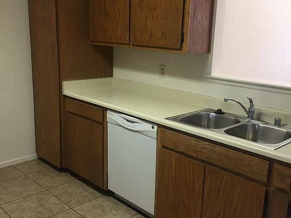 Pantry, dishwasher, sink side of galley kitchen.
