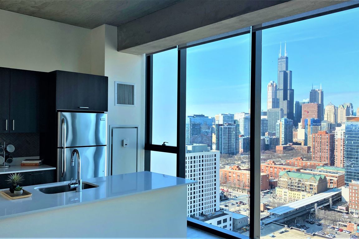 Our penthouse kitchens are fully upgraded and showcase floor-to-ceiling views of Chicago