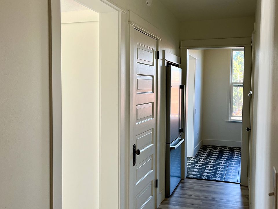 Hallway with coat closet.