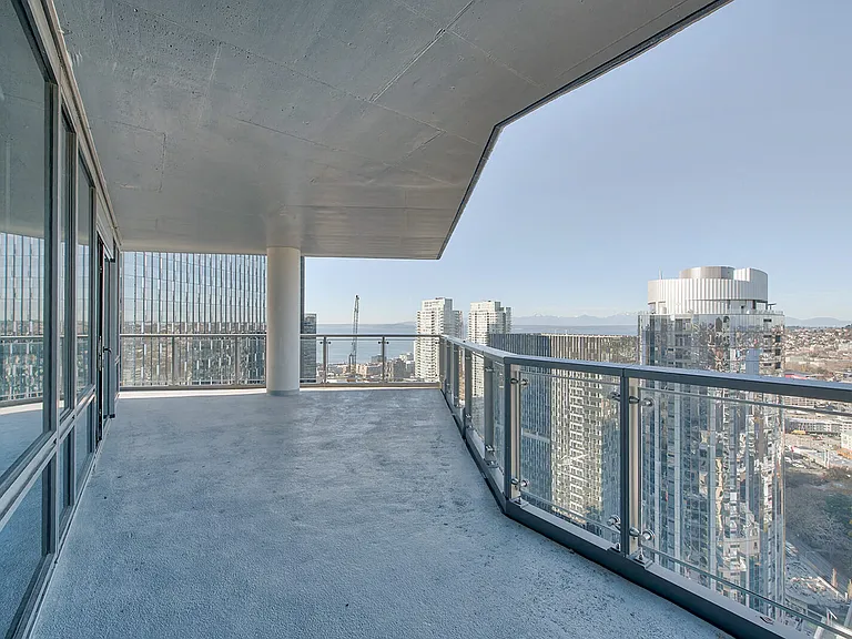 Expansive living space extends outdoors to private balconies