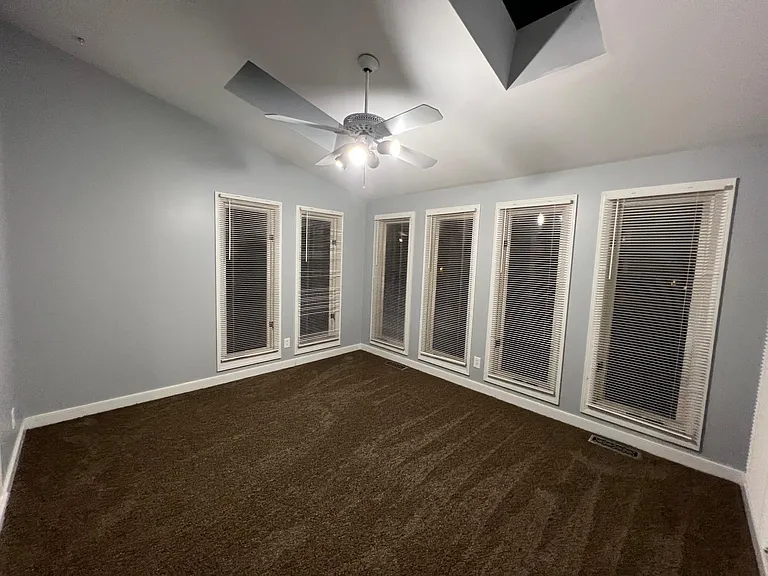 Looking into florida room from door to backyard (walking in from the backyard)