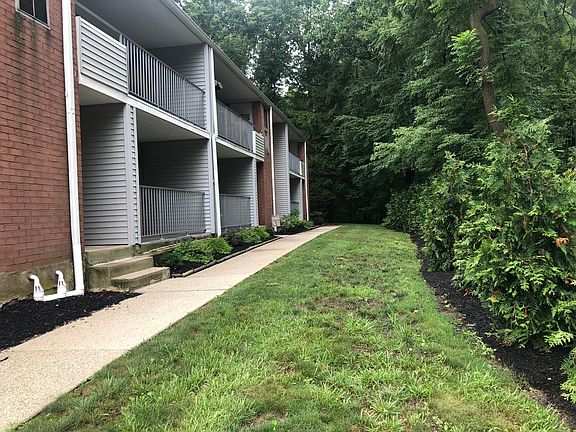 F7 walkway from parking lot. Condo is first left. Beautiful view of the trees.