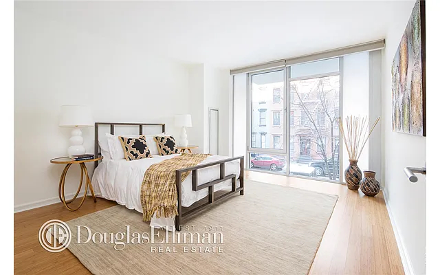 Sold by Douglas Elliman | media 13
