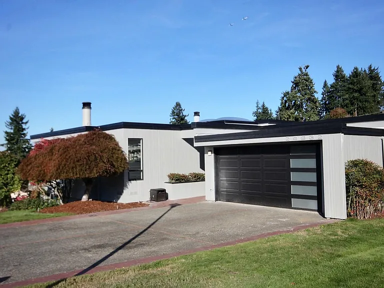 Curb appeal. A spacious two car garage.