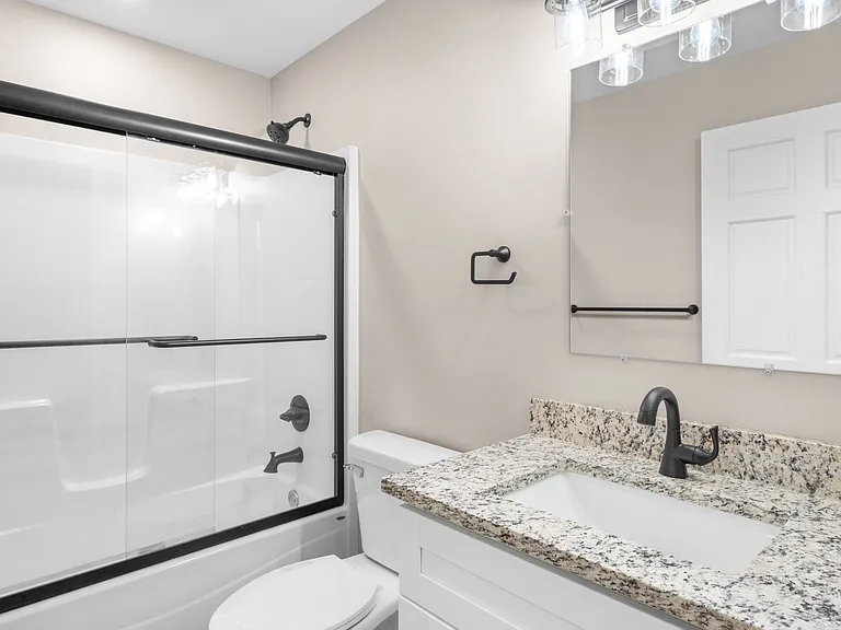 Second bathroom has a tub and shower.