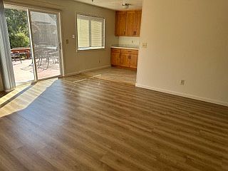 Dining room looking toward back patio and kitchen area