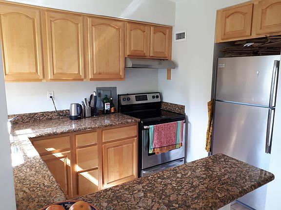 Kitchen with all new stainless steel appliances.