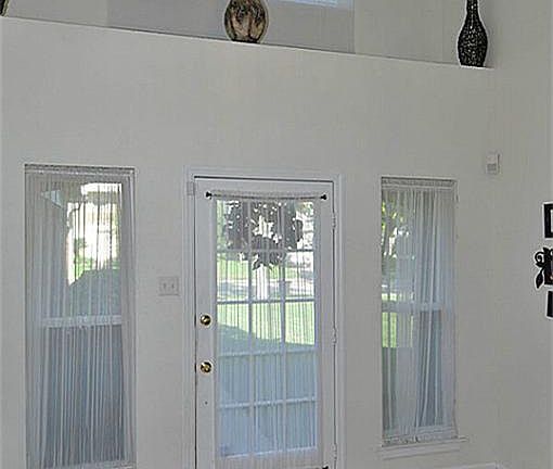 Decorative shelf above front door entry - light, bright and welcoming
