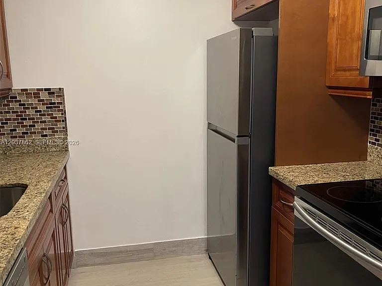 151 SW 135th Ter #108T — Photo 6