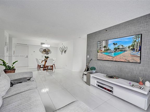 3rd image of 3600 Mystic Pointe Dr APT 203