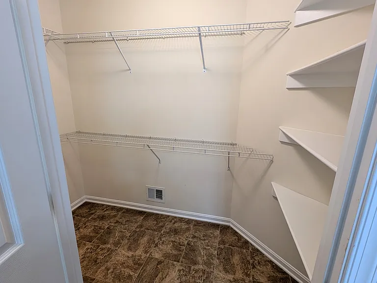 Master walk in closet, attached to bathroom