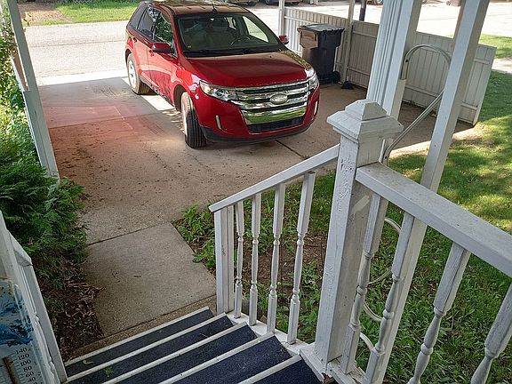 Carport easily parks 2 cars.