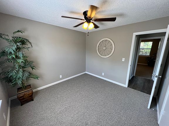New Carpet and Ceiling fans in Bedrooms