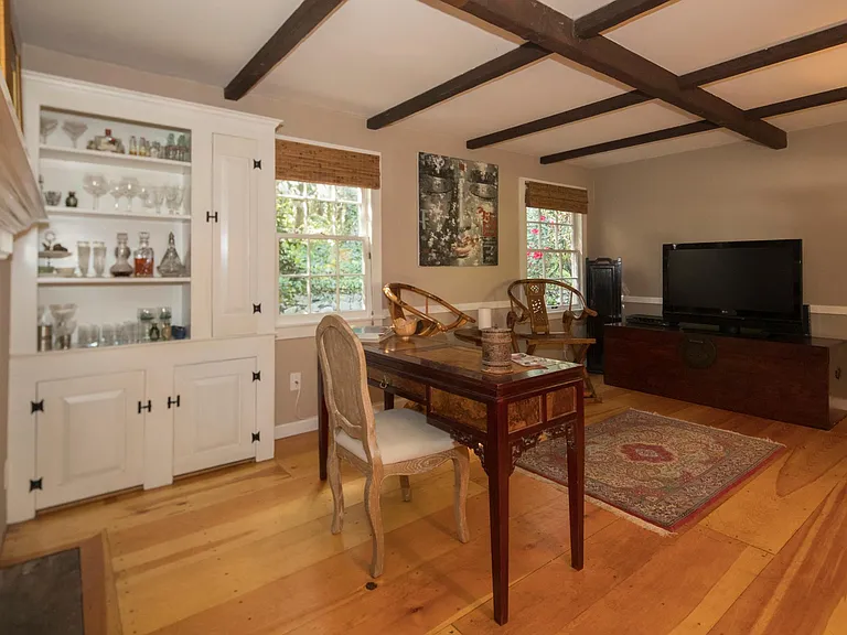 Family room with working fireplace.