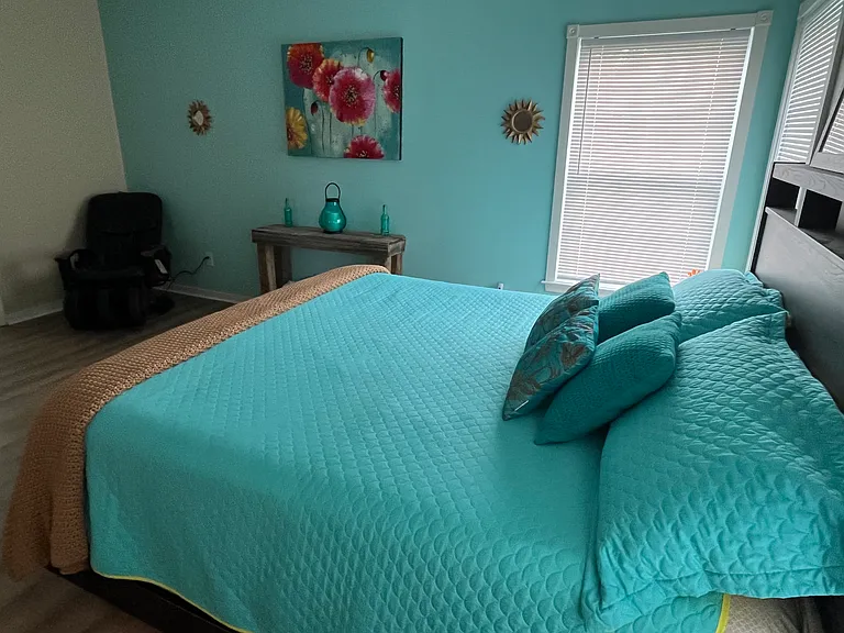 Downstairs master bedroom with massage chair