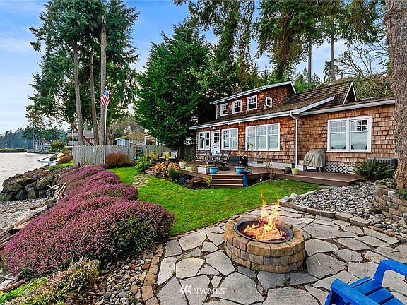 This magnificent waterfront home was featured on the COVER of 2 national publications: "DREAM CABIN SHOWCASE" and CABIN LIFE."  You will soon see why...