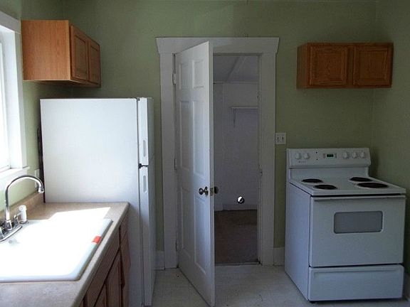 Kitchen leads out into the utility room where there is room for a washer and dryer.