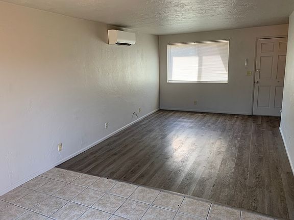 Downstairs living area with AC/heat unit