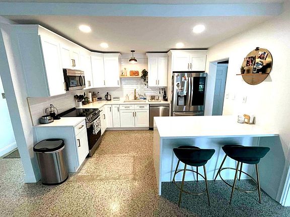 Kitchen with bar stools