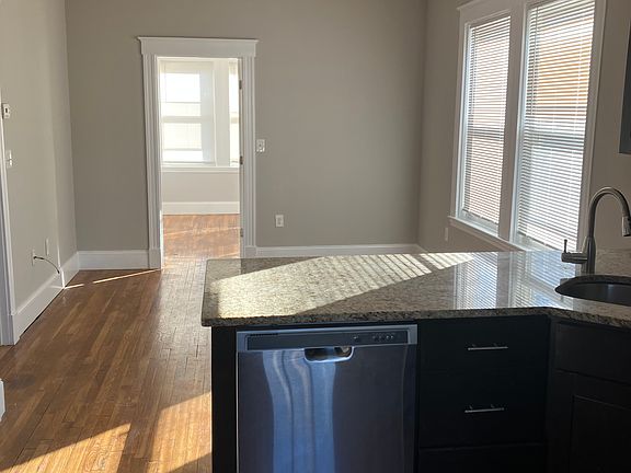 view from back door that leads to kitchen, living room and bedroom 3