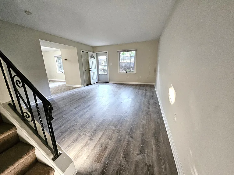 Spacious living room with luxury vinyl plank flooring