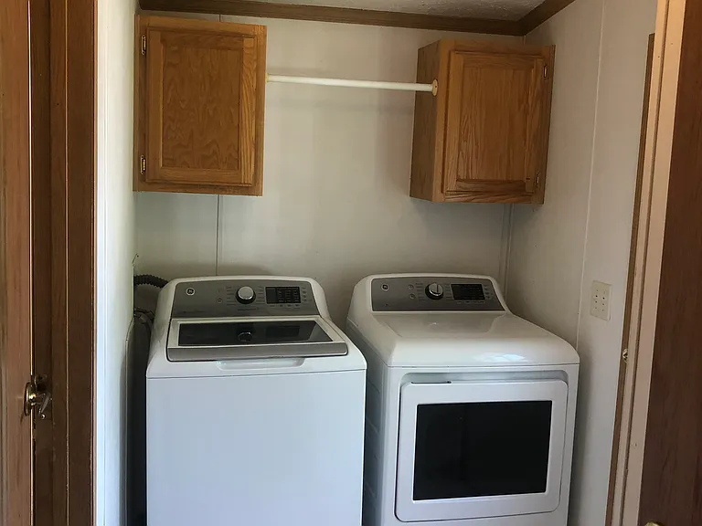 Newer Washer/Drier in dedicated Laundry Room.