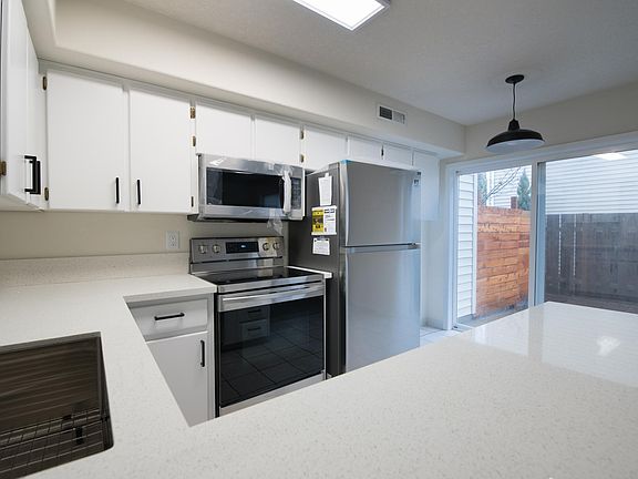 All kitchen appliances, sink, faucets and top quality quartz countertop are brand new.
