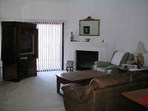 Living Room w/Fireplace and Sliding door to balcony