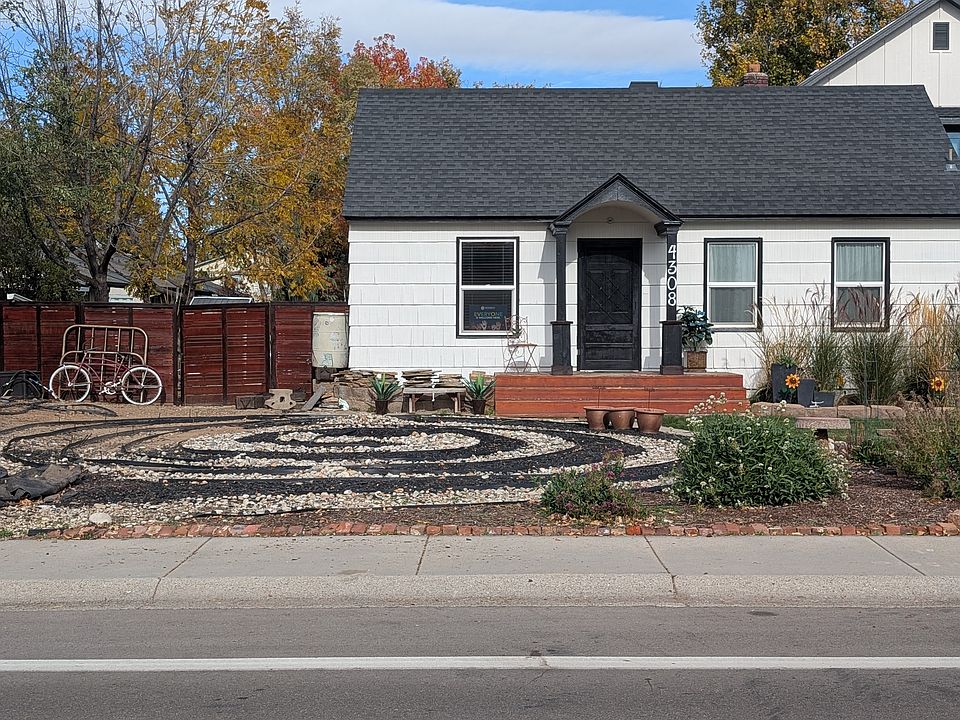 Freshly painted Bungalow with uniquely landscaped front yard.