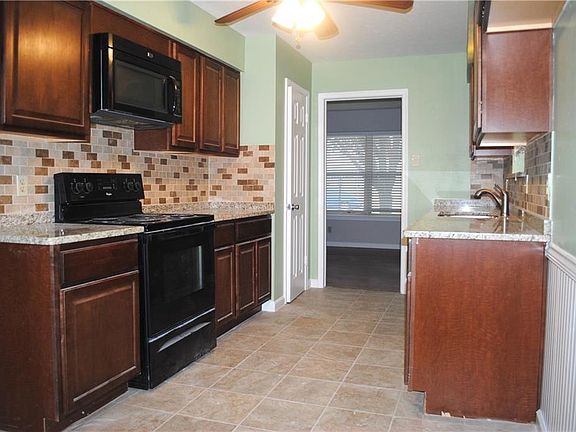 5th image of 8909 Forest Cliff Dr