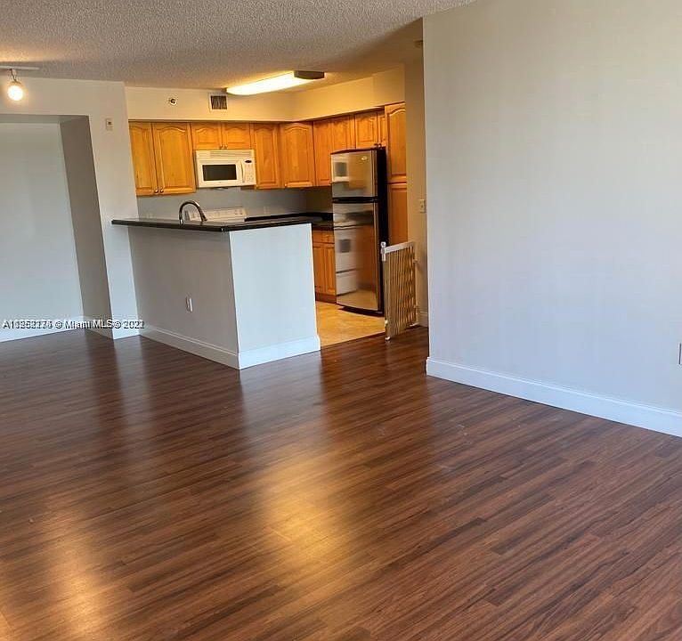 1st image of 19601 E Country Club Dr #7403