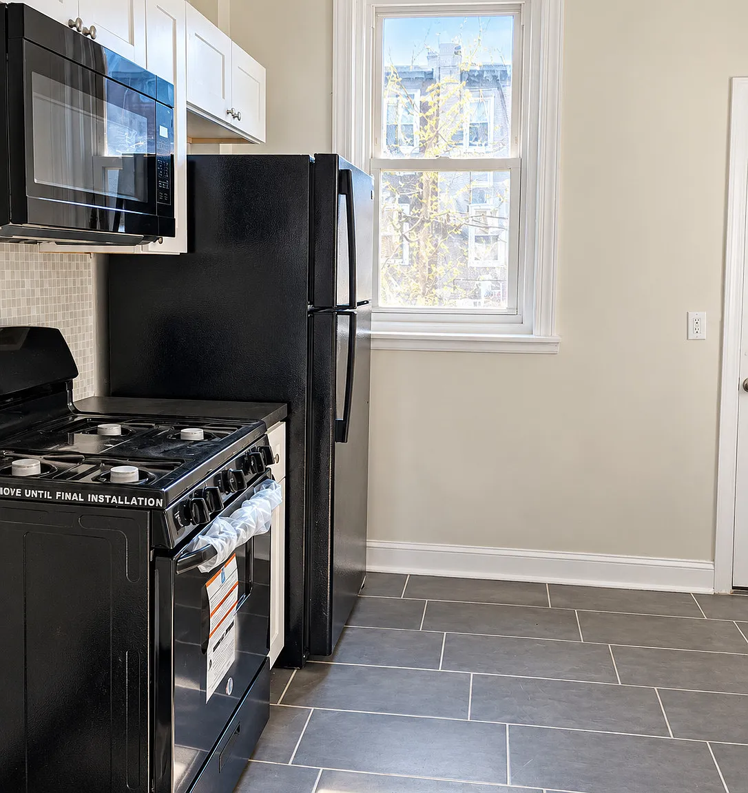 Freshly Updated 3-Bedroom West Oak Lane Home with Room to Settle In — Photo 4