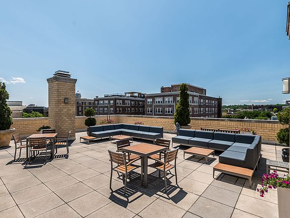 Rooftop deck with seating and lounge area