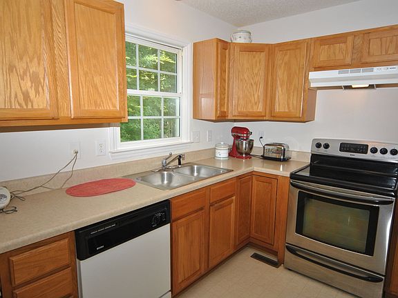 Kitchen with new Stainless Steel (looking) Stove