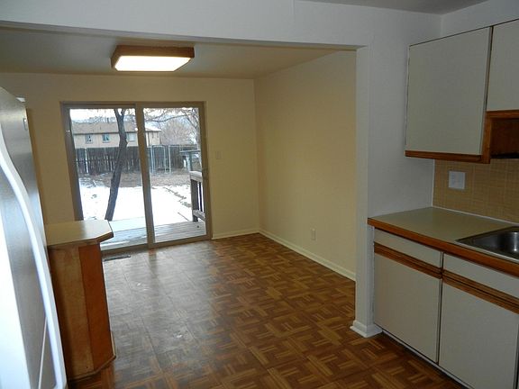 View from kitchen to kitchen dining area