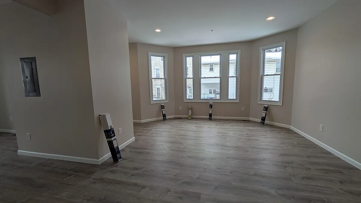 spacious and bright living room and dining room off of the front entrance - 464 Race St #1