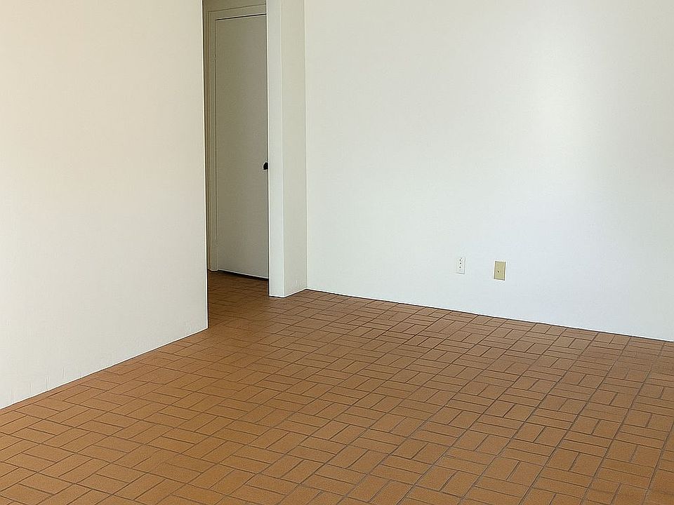 Other view of the main entrance/living room

Access to one of the bedrooms and bathroom