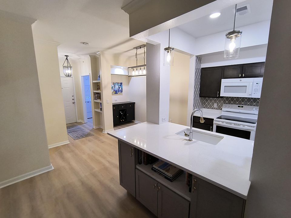 Open floor plan concept. Newly remodeled December 2023!
Dining area features a built-in with wine rack perfect for use a bar, serving sideboard, and/or additional storage!