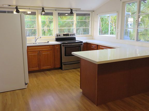 Kitchen cherry cabinets quartz counters